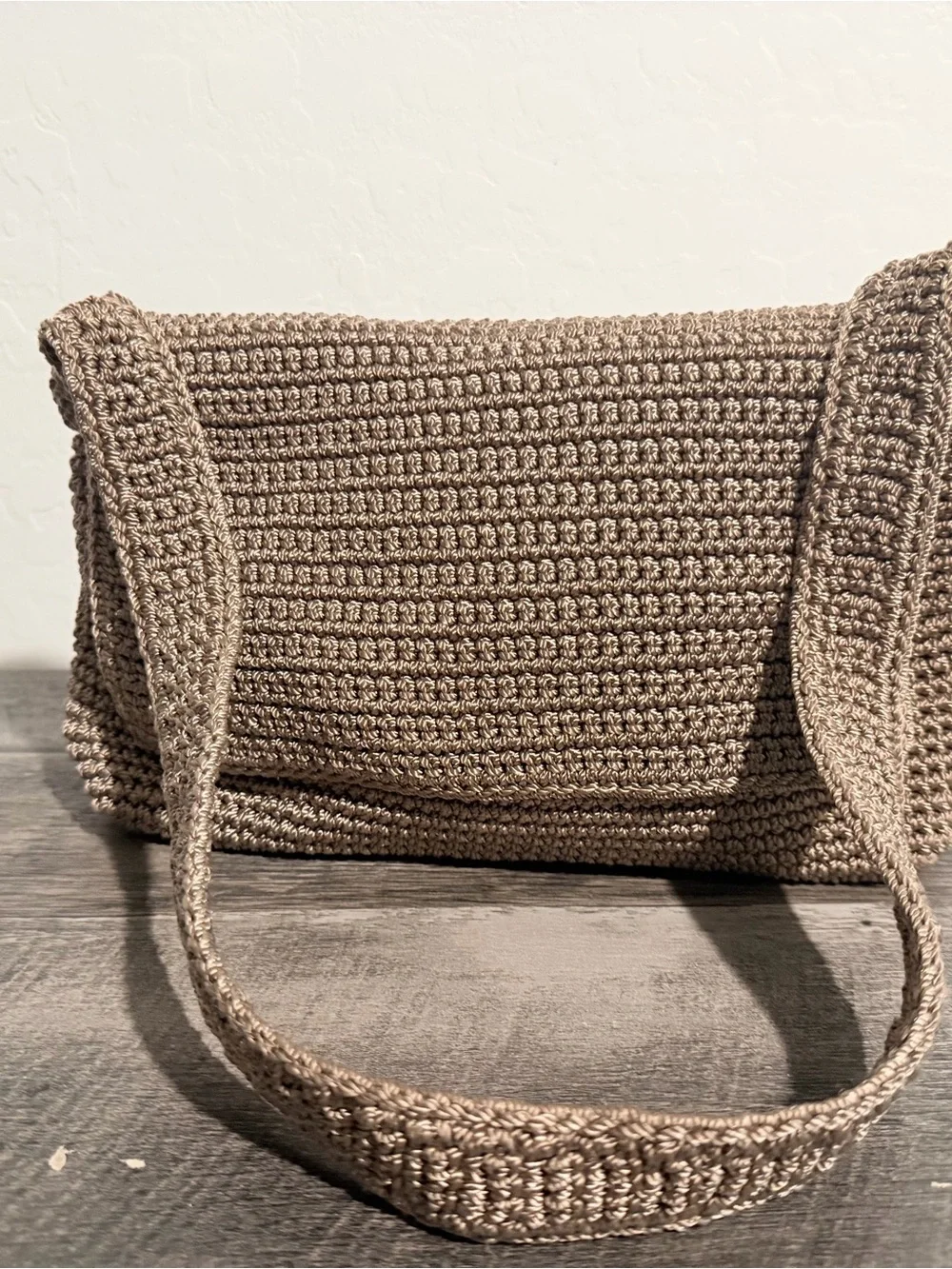 The Sak Brown Crochet Shoulder Bag with Fold-Over Flap